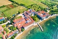 Dajla abandoned convent aerial panoramic coastline view