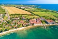 Dajla. Aerial view of coastal village of Dajla and abandoned convent