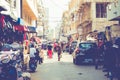 DAKAR, SENEGAL - NOVEMBER 11, 2019: People working and traffic at Senegal capital Dakar, West Africa