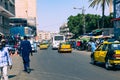 DAKAR, SENEGAL - NOVEMBER 11, 2019: People working and traffic at Senegal capital Dakar, West Africa Royalty Free Stock Photo