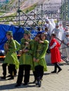 Young girls actress in traditional Circassian clothes preparing for a performance at the festival of Adyghe cheese in the foothill