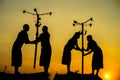 Daklak, Vietnam - Mar 9, 2017: Ede ethnic minority people perform traditional dance in their festival in sunset period. Silhouette