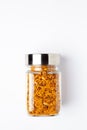 Dal Biji or Dal moth in a glass jar with lid closed , made with roasted Masoor Dal black lentils