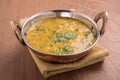 Dal curry on wooden background Royalty Free Stock Photo