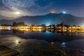 Dal lake Golden lake at Srinagar, India as seen on a full moon night with house boats lit up.