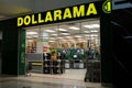 Dalarama store in the mall shopping everything for a dollar cheap prices cash registers entrance signboard name yellow