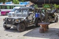 Old rusty american pickup car, no cab, vietnam american car standing in a cave