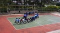 Student playing games in shoolyard in Dalat University.