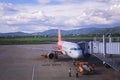 A passenger airplane of Vietjet Air docking at Lien Khuong Airport DLI in Dalat, Vietnam Royalty Free Stock Photo