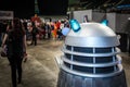 Dalek following a woman at the Yorkshire Cosplay Convention Royalty Free Stock Photo