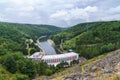 Dalesice Hydro Power Plant on the Jihlava River and in the background the cooling towers of nuclear power plants Dukovany, Trebic