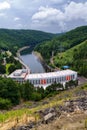 Dalesice Hydro Power Plant on the Jihlava River and in the background the cooling towers of nuclear power plants Dukovany, Trebic