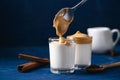 Dalgona coffee, Fluffy cream coffee whipping on milk, Korean coffee style Royalty Free Stock Photo