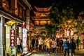 Dali old town Wuhua Lou tower illuminated at night with people in Dali Yunnan China Royalty Free Stock Photo