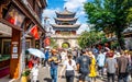 Dali old town Wuhua Lou tower with people and sunny blue sky in Dali Yunnan China Royalty Free Stock Photo