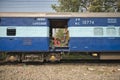 Dalit people traveling in the freight car. They are too poor to ever pay for a train ticket. They represent the lowest caste