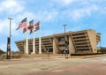 Dallas City Hall with American, Texas, and Dallas Flags in front Royalty Free Stock Photo