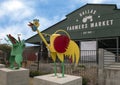 Dallas Farmers Market with whimsical rooster and frog, two of six metal sculptures, Dallas, Texas