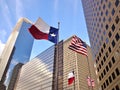 Dallas Flag and United States Flag Waving in the Wind - Downtown Houston, Texas Royalty Free Stock Photo