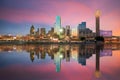 Dallas skyline reflected in Trinity river at sunset