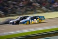 DALLAS, TX - NOVEMBER 04: Jimmie Johnson 48 passing Brad Keselowski 2 for the win at the Nascar Sprint Cup AAA Texas 500 at Texas Royalty Free Stock Photo