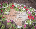 Welcome to Microsoft text on Texas map with flower decoration at office entrance