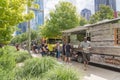 Food truck vendor with customer buy and taste variety of food