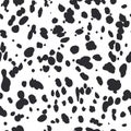 Dalmatian seamless pattern. Animal skin print. Dog and cow black dots on white background. Vector Royalty Free Stock Photo