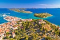 Dalmatian town of Tribunj church on hill and amazing turquoise archipelago aerial view Royalty Free Stock Photo