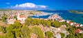 Dalmatian town of Tribunj church on hill and amazing turquoise archipelago aerial view Royalty Free Stock Photo