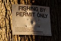 Dalry Angling Association sign warning of fishing by permit only, Scotland