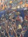 The Dalston Lane Mural, painted in 1985 by Ray Walker. This now iconic image is based on the 1983 Hackney Peace Carnival