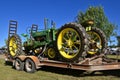 John Deere General Purpose tractor on flatbed trailer,