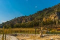 DALYAN, TURKEY: Rock-cut temple tombs of the ancient city Kaunos in Dalyan. Royalty Free Stock Photo