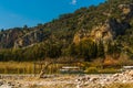 DALYAN, MUGLA, TURKEY: Rock-cut temple tombs of the ancient city Kaunos in Dalyan. Royalty Free Stock Photo