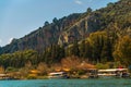 DALYAN, MUGLA, TURKEY: Rock-cut temple tombs of the ancient city Kaunos in Dalyan. Royalty Free Stock Photo