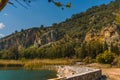 DALYAN, MUGLA, TURKEY: Rock-cut temple tombs of the ancient city Kaunos in Dalyan. Royalty Free Stock Photo