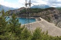 Dam and electricity pole, Lake Serre-Poncon, French Hautes-Alpes