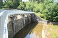 Dam Hradiste with bridge on river Cerna - Black Royalty Free Stock Photo