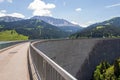 Dam in Longrin, Switzerland with a beautiful landscape in the background