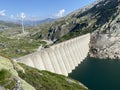 The dam Lucendro or concrete dam on the reservoir lake Lago di Lucendro in the Swiss alpine area of the St. Gotthard Pass