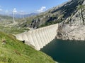 The dam Lucendro or concrete dam on the reservoir lake Lago di Lucendro in the Swiss alpine area of the St. Gotthard Pass