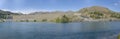 Dam and shore at Benmore lake, New Zealand Royalty Free Stock Photo