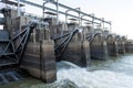 Dam spillway gate with water flowing through