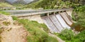 Dam Wall with waterfall in Nuria Valley Royalty Free Stock Photo