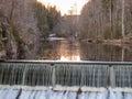 Dam with waterfall at Nes Verk Iron Works Museum in Tvedestrand Norway