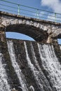 The dam and waterfall on the river Lomnica Royalty Free Stock Photo