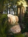 Dama de Elche figure in palm tree garden. Alicante. Spain