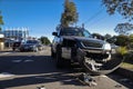 Damage car crushing collision against road side guard gutter in early morning at Sydney suburb Royalty Free Stock Photo