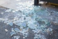 Shards of broken glass on floor